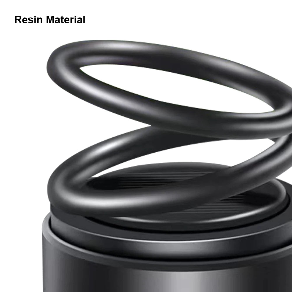 Solar Powered Car Fragrance Diffuser – Rotating Double Ring Aromatherapy Decoration