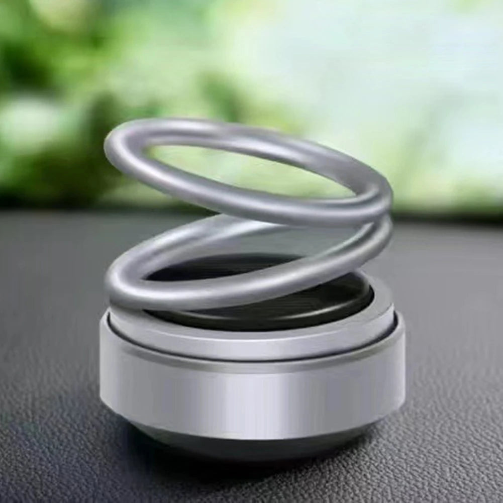 Solar Powered Car Fragrance Diffuser – Rotating Double Ring Aromatherapy Decoration